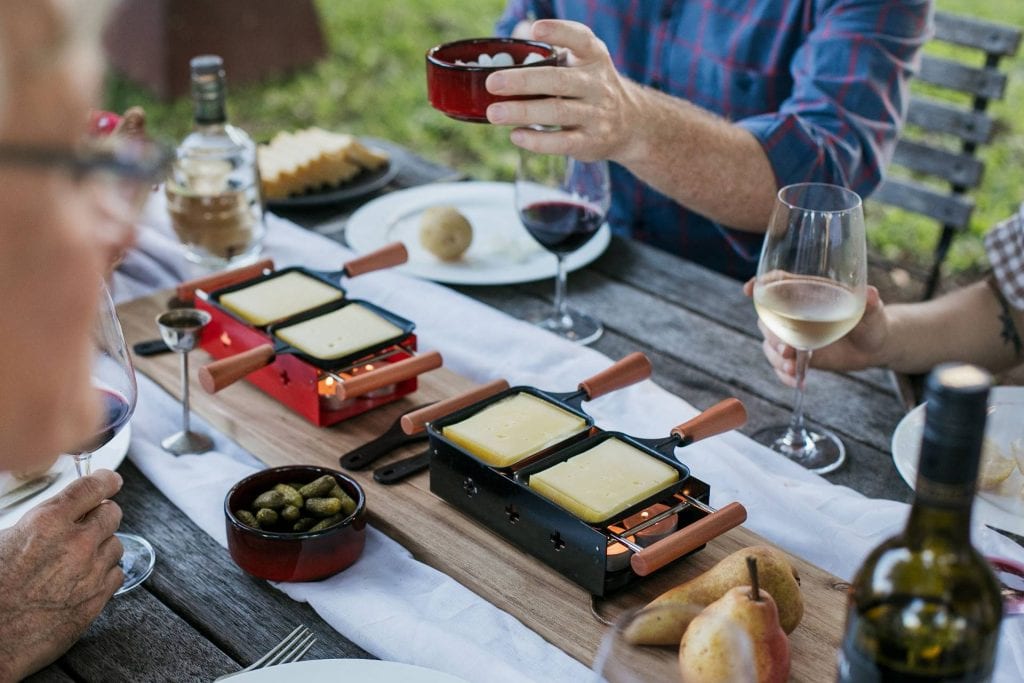 Fromart melting cheese on table