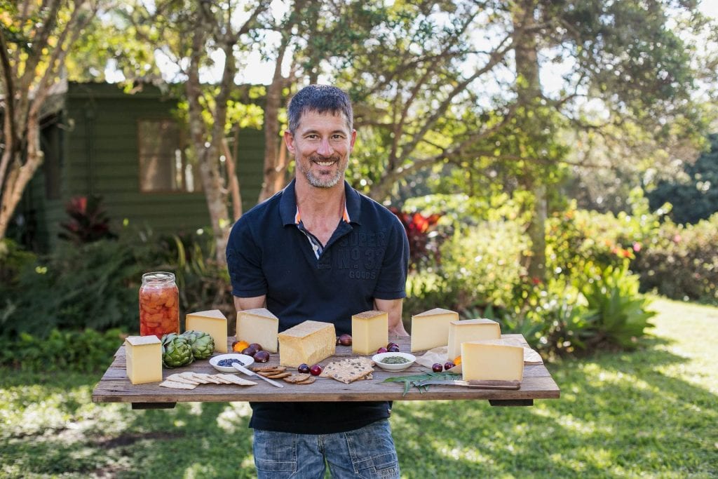 Fromart Christian holding cheese board