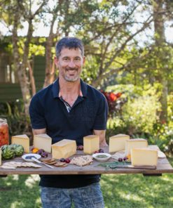 Fromart Christian holding cheese board